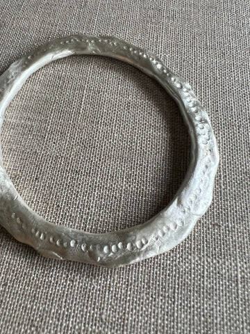 CAST SILVER - Bangle in solid sterling silver with hammered detail