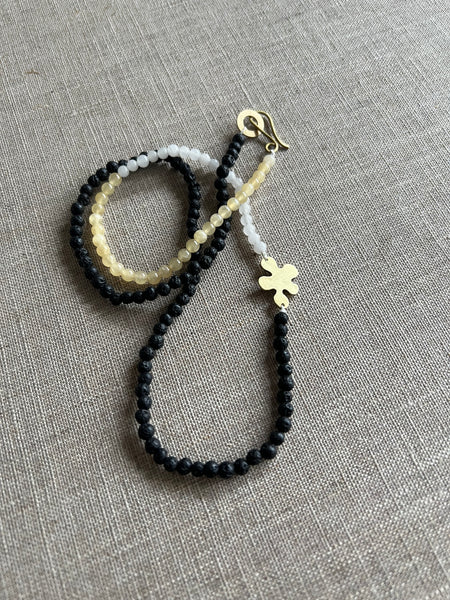 BEADED - Brass flower semi-precious bead necklace in black and white tones